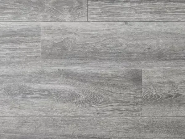 Grey oak-look rigid-core luxury vinyl plank flooring installed by Artistry Floors